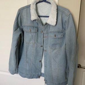 Light denim Jean jacket no tag on it brand new